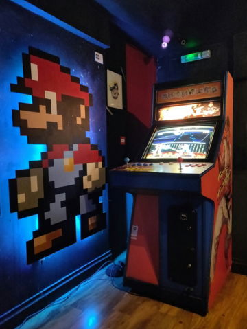 black and red arcade machine